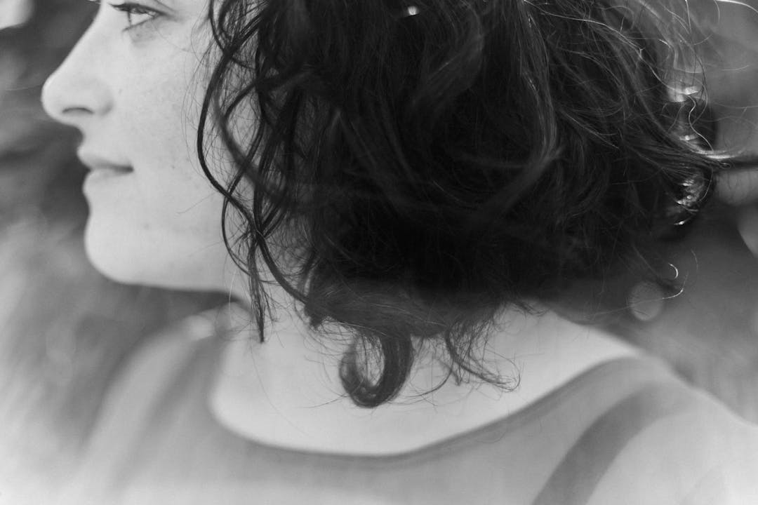 black and white closeup of a woman in profile